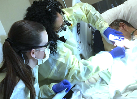 Sheba Jones, RDH and dental hygiene student providing oral care_0