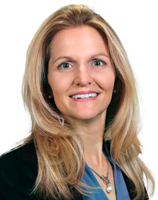 Head-and-shoulders Portrait of a Smiling Blonde Woman in a Blue Blouse and Black Blazer.