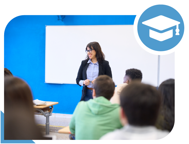 Instructor Presenting a Lesson to Students in a Bright Blue Classroom with a Whiteboard at the Front.